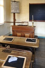 Classroom with teachers desk and ABC board