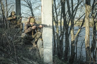 Ukrainian soldiers during a patrol along the Ingulez River. In the small town of Snihurivka