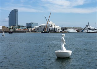 Buoy with sculpture in the harbour