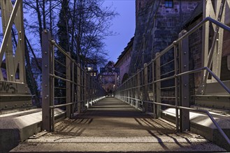 Chain footbridge in evening illumination