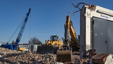 Demolition work with heavy construction machinery
