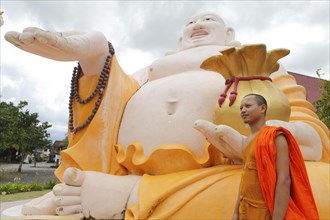 Monk at the thick Buddha Songachay