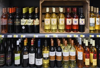 Sales rack various wine bottles