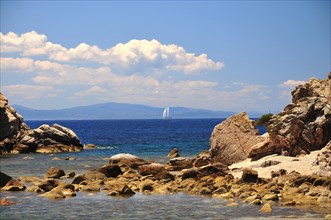 Sailing boat in the Bouche de Bonifacio nature park in the south of Corsica