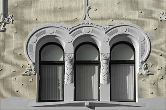 Art Nouveau ornaments on the window of a house facade around 1900