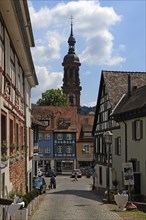 Old half-timbered houses in the Egelgasse with a view of the St. Marien parish church