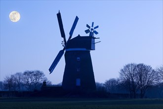 Breber windmill with full moon