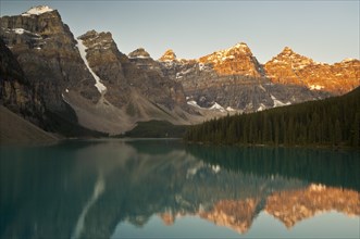 Valley of the Ten Peaks reflected in Moraine Lake at sunrise