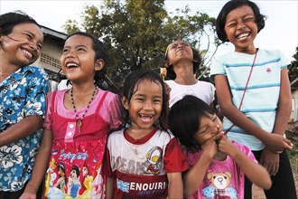 Laughing children in the Muslim village of Batu Village