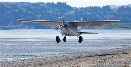 Cessna takes off from the beach in Katmai National Park