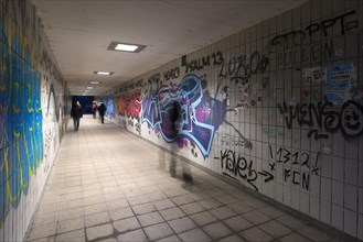 Pedestrian subway with graffiti on the walls