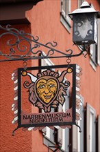 Hanging sign of the Narrenmuseum at the Niggelturm