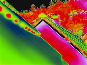 Thermal image or thermography shows weak points in the insulation of residential buildings
