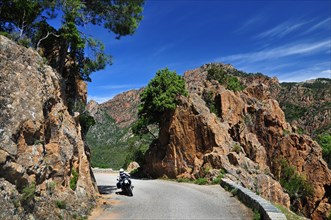 Motorcyclists on the pass road from Porto to Evisa through the Ota Valley in Corsica