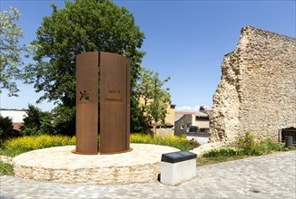 Remains of the medieval city wall and reminder of an earlier bell tower