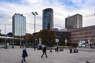 Skyline of the city centre at the forecourt of Dortmund main station with RWE Tower