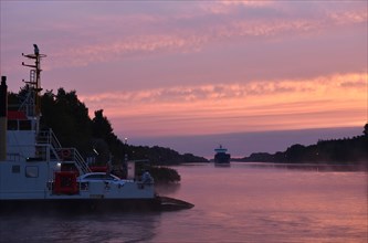 Ferry at sunrise in the Kiel Canal