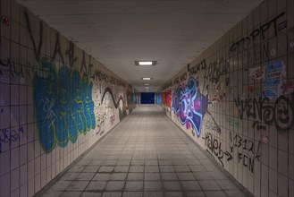 Pedestrian subway with graffiti on the walls