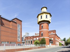 Factory facilities and water tower of the Homann Feinkost food factory