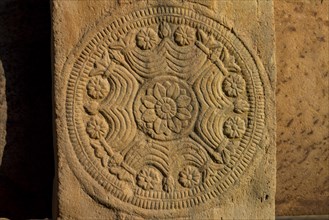 A carved medallion