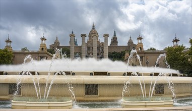 Fountain with water fountains in front of the National Museum of Catalonia in Montjuic