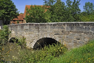 Old double-arched stone bridge