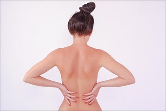 Half naked woman with aching back