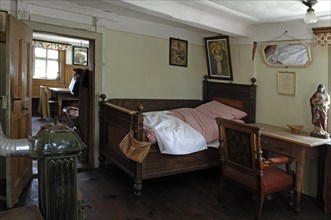 Bedroom with view into the living room