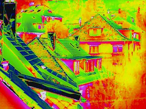 Thermal image or thermography shows weak points in the insulation of residential buildings