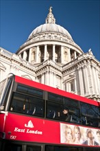 St. Pauls Cathedral with a red London tour bus