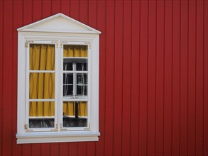 Window of a colourful wooden house