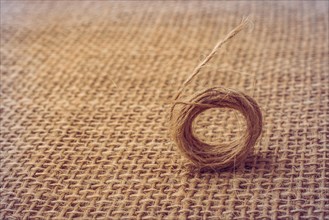 Roll of brown color linen string paper background