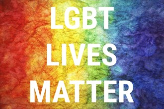 LGBT lives matter words on LGBT textured background