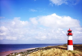 Lighthouse and dunes at the elbow