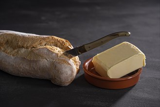 Ciabatta bread with knife and butter