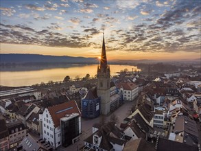 Aerial view of the old town of Radolfzell on Lake Constance at sunset with the cathedral