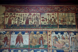 Frescoes on the outer wall. The Voronet Monastery