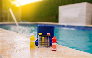 Mini tester for pool maintenance. Water test kit for swimming pools