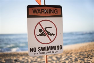 No swimming sing at the beach in the north shore of Oahu