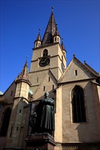 Protestant town parish church and statue of Friedrich Teutsch