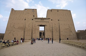Pylon of the temple of Edfu with visitor chairs