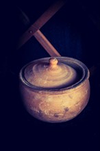 Ancient metal jug in oriental style in view