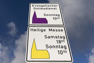 Signs indicating religious services of both denominations