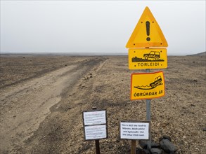 Traffic sign in volcanic landscape