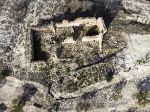 Aerial view of farm house in ruins in olive grove near the village of Gorga