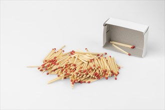 Stack of matches in front of almost empty box