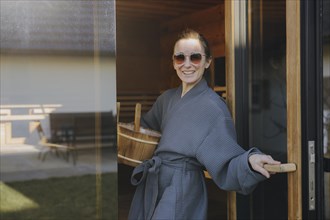 Woman taking a sauna