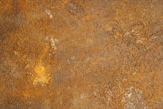 Textured metal surface with detailed traces of corrosion and rust