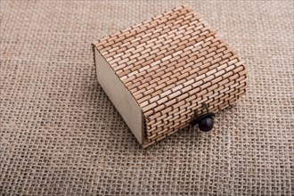 Little Straw wooden box of light brown color