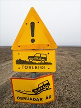Traffic sign in volcanic landscape